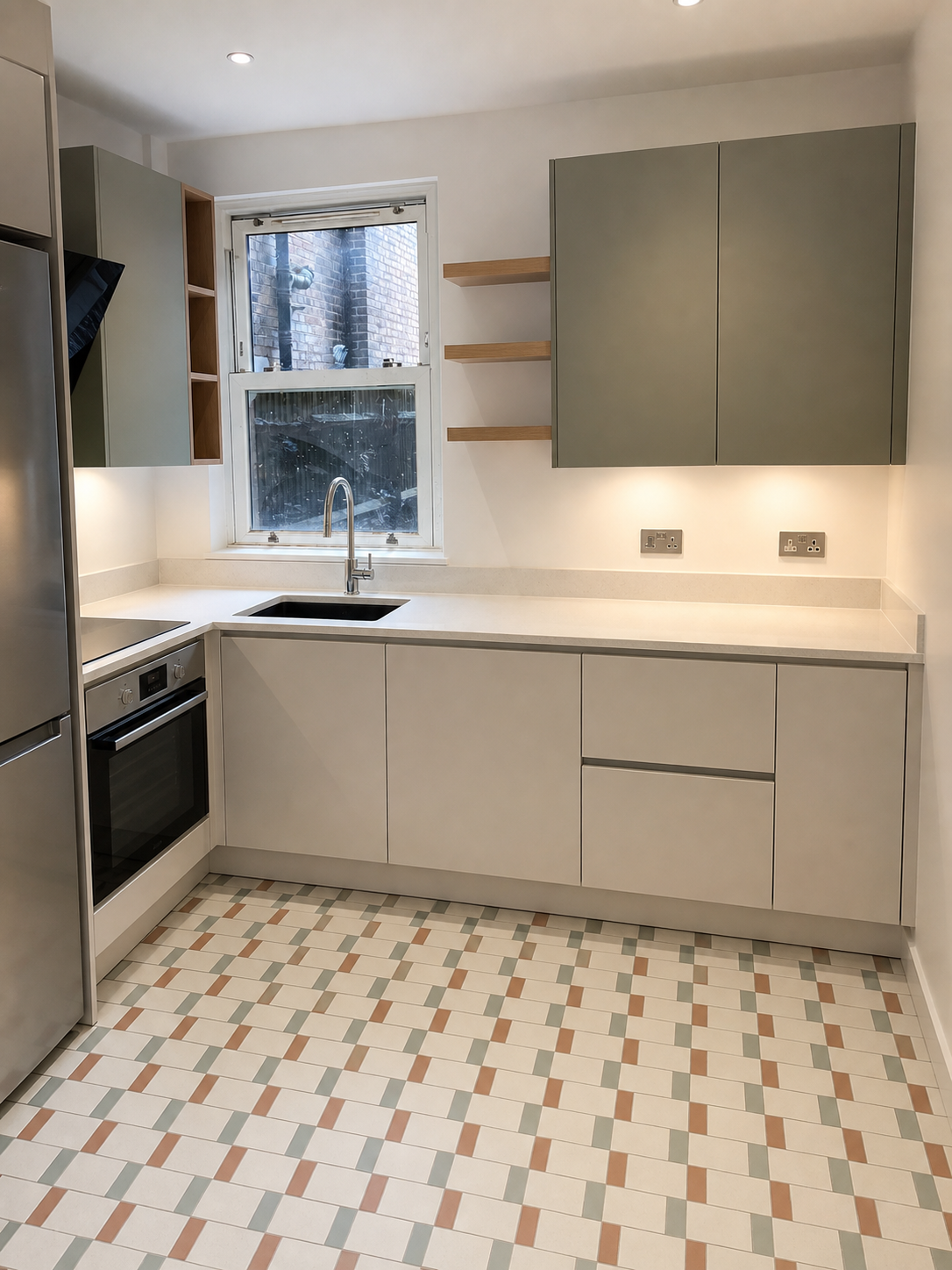 Completed sage and oak kitchen from the same approximate viewpoint